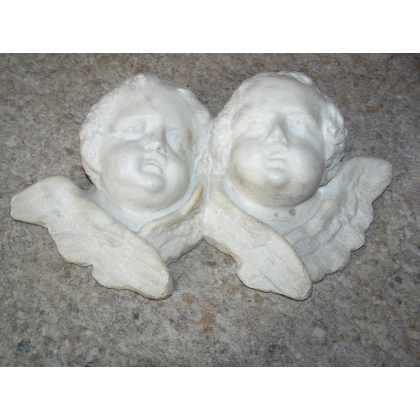 Sculpture "Heads of angels"