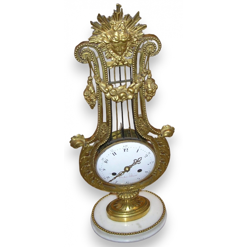 Pendule Louis XVI "Lyre" en bronze doré