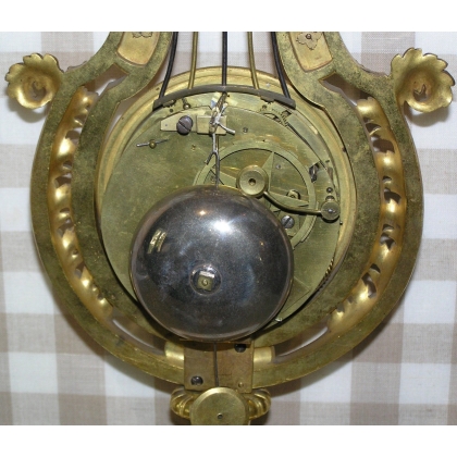 Louis XVI ‘Lyre’ clock in gilded bronze at Moinat SA – Antiques and home décor