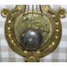 Louis XVI ‘Lyre’ clock in gilded bronze at Moinat SA – Antiques and home décor