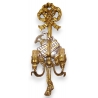 Applique en bois sculpté doré