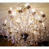 Gilded iron chandelier with crystals, 24 on  Moinat SA  - Antiques and home décor