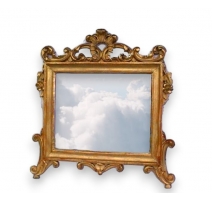 Miroir Baroque rectangulaire sculpté.