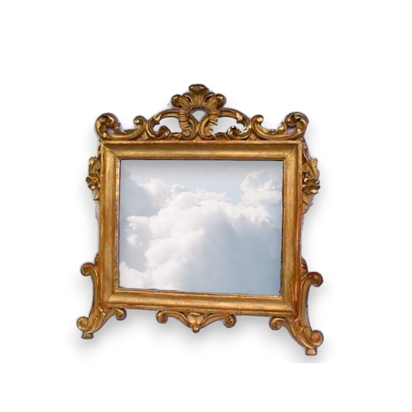 Miroir Baroque rectangulaire sculpté.