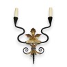 Wrought-iron wall light with a patinated finish and decorative details by Moinat SA – Antiques and home décor