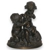 Bronzegruppe „2 Putti“, signiert MACHAULT auf Moinat SA – Antiquitäten und Dekoration