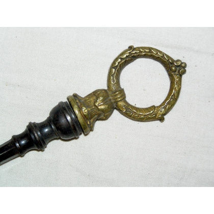  Pelle et pince en fer forgé/bronze sur  Moinat SA  - Antiquités décoration