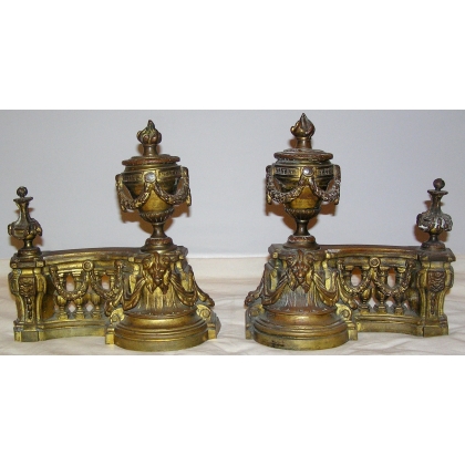  Paire de chenets Louis XVI en bronze sur  Moinat SA  - Antiquités décoration