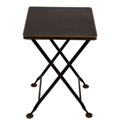  Table pliante en tôle noir et filet or sur  Moinat SA  - Antiquités décoration