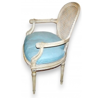 Fauteuil Louis XVI, canné, laqué, coussin cuir