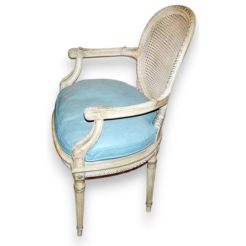 Fauteuil Louis XVI, canné, laqué, coussin cuir