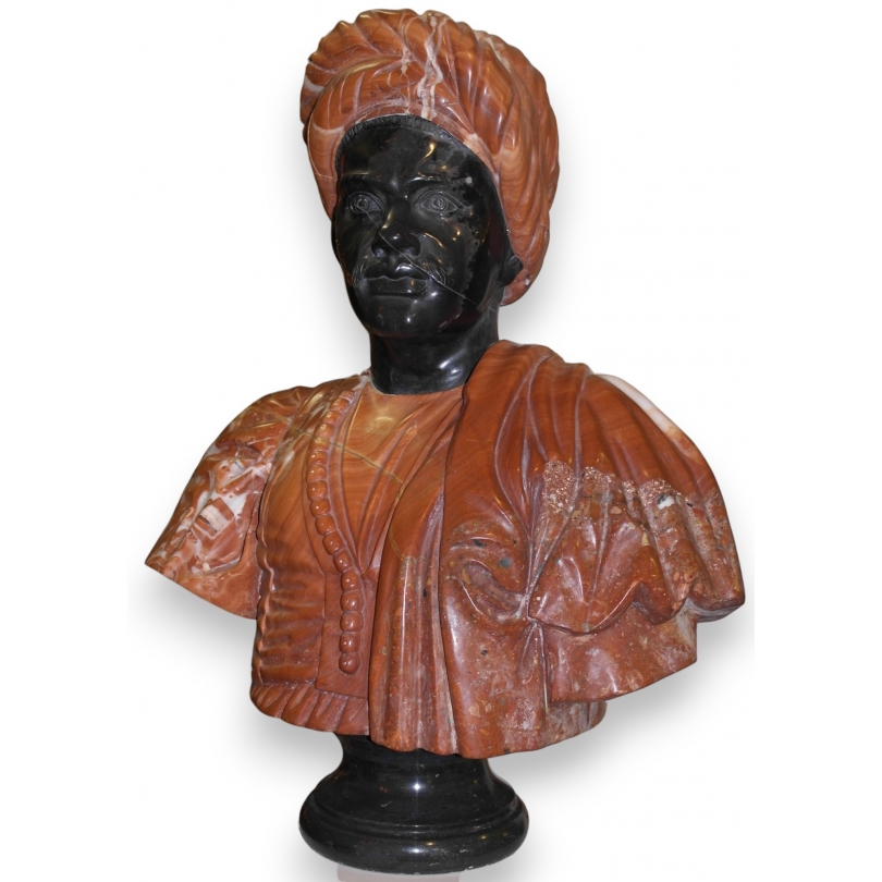 Red and black marble bust of a man at Moinat SA – Antiques and home décor