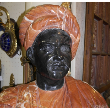 Red and black marble bust of a man at Moinat SA – Antiques and home décor