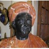Red and black marble bust of a man at Moinat SA – Antiques and home décor