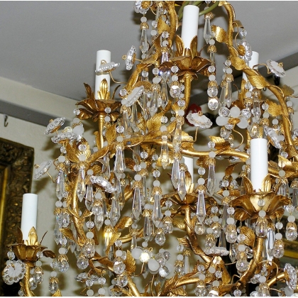 Lustre à cristaux et fer doré