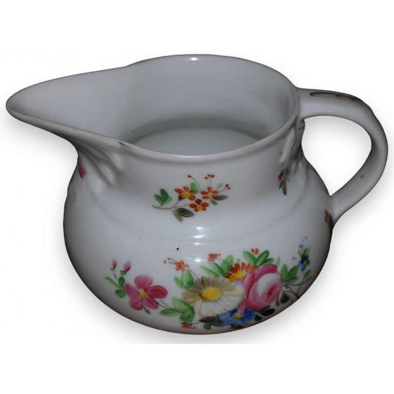 Pichet en porcelaine décor fleurs (félé)