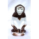 Monkey signed SANDOZ, brown an