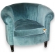 Fauteuil recouvert de velours bleu-vert