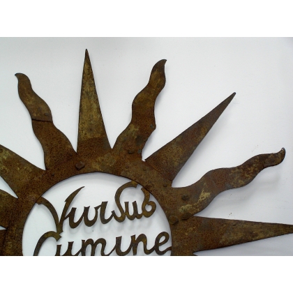 Wrought-iron ‘Soleil’ sign at Moinat SA – Antiques and home décor