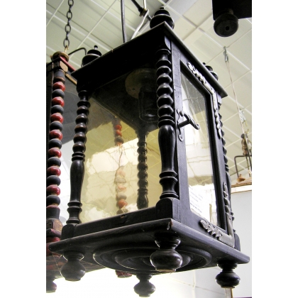 Wood and brass hanging lantern, available from  Moinat SA  - Antiques and home décor