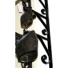 A set of iron cowbells at  Moinat SA  - Antiques and home décor
