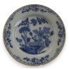  Assiette en faïence Delft (ébréchée) sur  Moinat SA  - Antiquités décoration