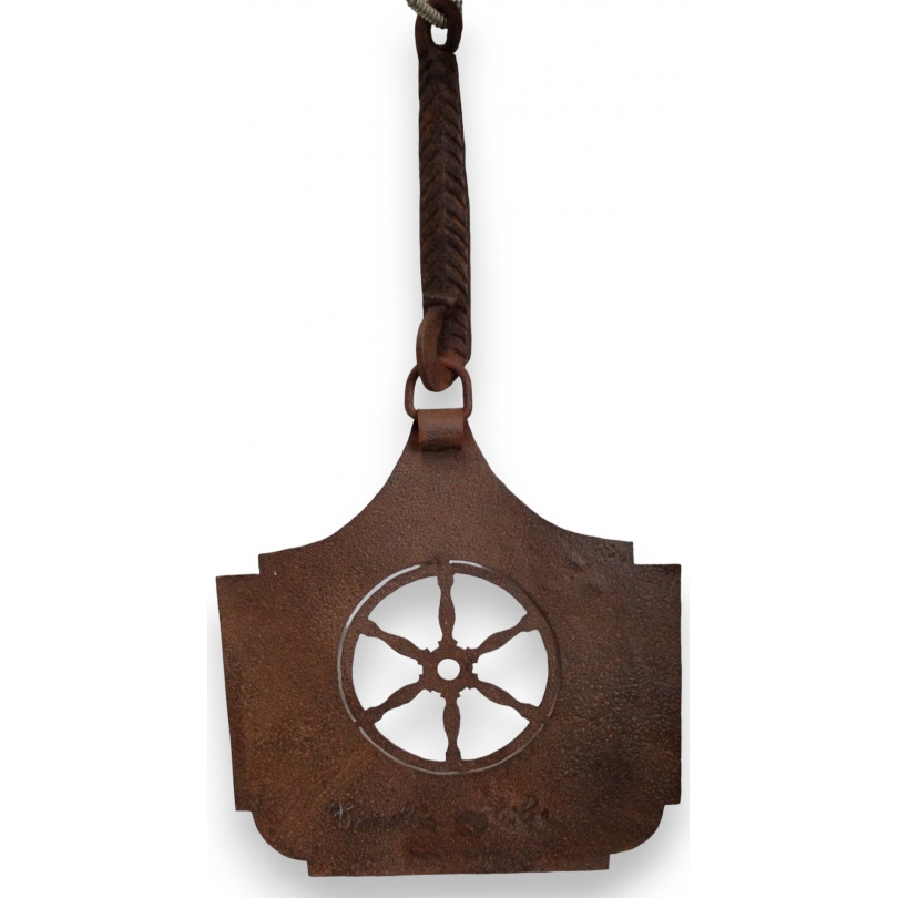 Wrought-iron ‘Wheel’ sign at Moinat SA – Antiques and home décor