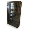  Vitrine en alu doré, rayons en verre sur  Moinat SA  - Antiquités décoration