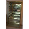  Vitrine en alu doré, rayons en verre sur  Moinat SA  - Antiquités décoration