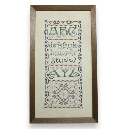  Tableau au point de croix "Alphabet" sur  Moinat SA  - Antiquités décoration