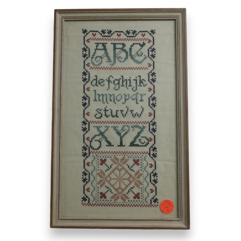  Tableau au point de croix "Alphabet" sur  Moinat SA  - Antiquités décoration