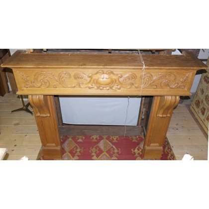 Henri II-style oak fireplace at  Moinat SA  - Antiques and home décor