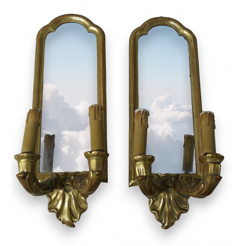  Paire d'appliques-miroirs en bois doré sur  Moinat SA  - Antiquités décoration