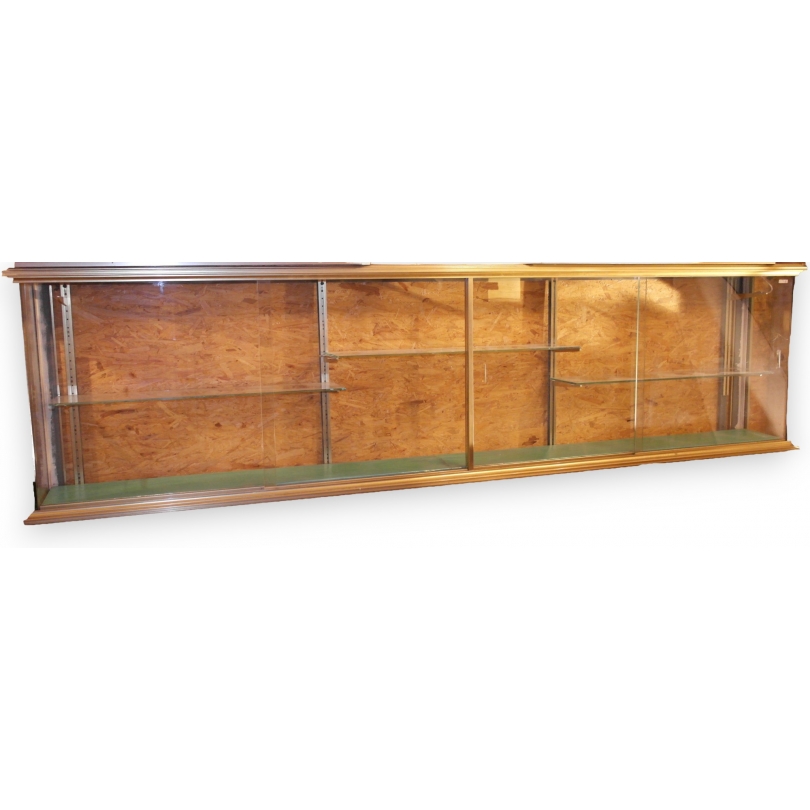  Vitrine en laiton avec rayons en verre sur  Moinat SA  - Antiquités décoration