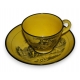 Tasse et sous-tasse en faïence jaune de