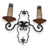  Applique en fer forgé à 2 lumières sur  Moinat SA  - Antiquités décoration