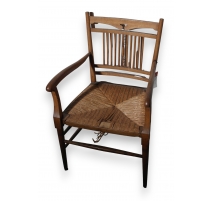 Fauteuil 1900 en chêne, paillé