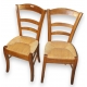 Série de 8 chaises paillées en noyer