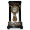 Empire-style clock with wooden columns at  Moinat SA  - Antiques and home décor