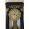 Empire-style clock with wooden columns at  Moinat SA  - Antiques and home décor
