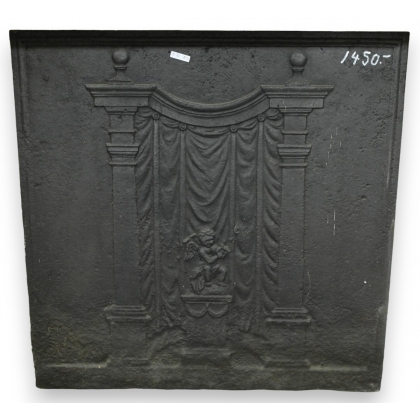  Plaque de cheminée en fonte "cupidon" sur  Moinat SA  - Antiquités décoration