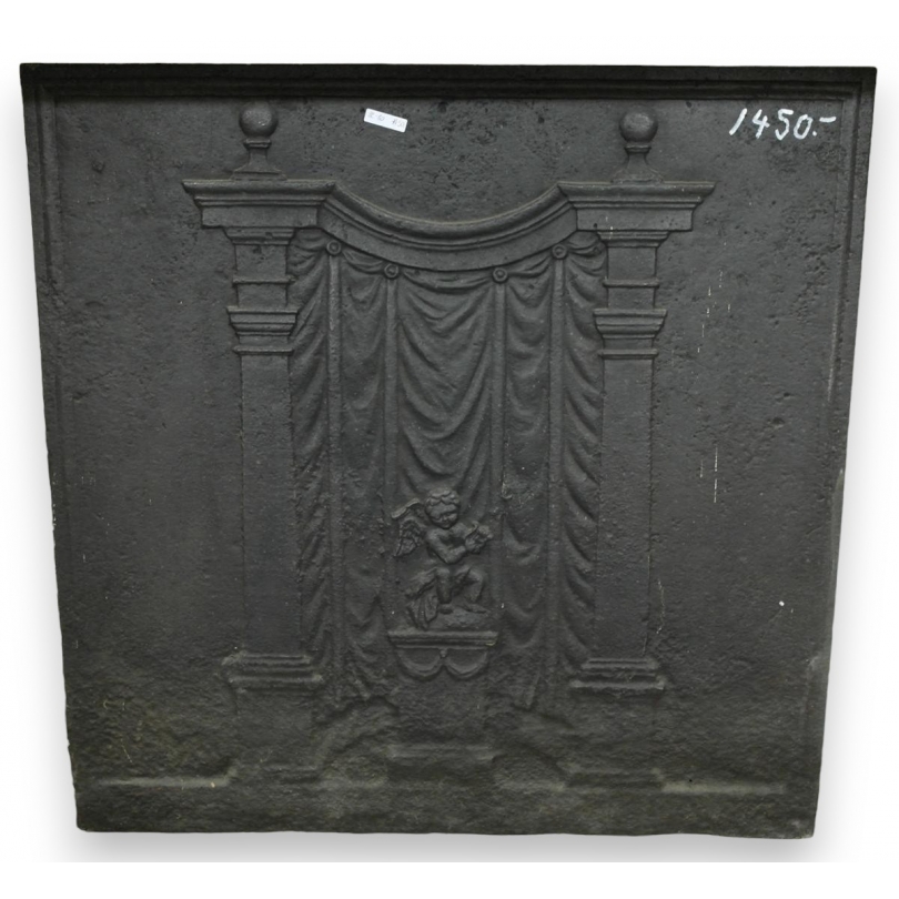  Plaque de cheminée en fonte "cupidon" sur  Moinat SA  - Antiquités décoration