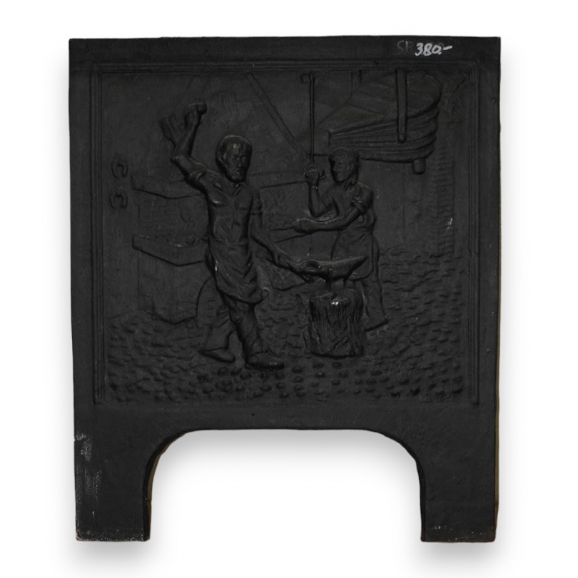 Plaque de cheminée en fonte "forgeron"