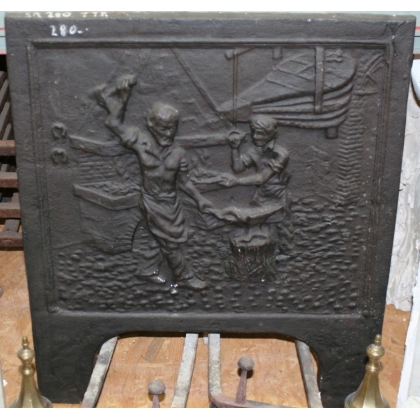  Plaque de cheminée en fonte "forgeron" sur  Moinat SA  - Antiquités décoration