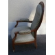 Fauteuil Voltaire recouvert de tissu
