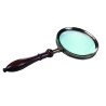 Regency-style magnifying glass with wooden handle at  Moinat SA  - Antiques and home décor