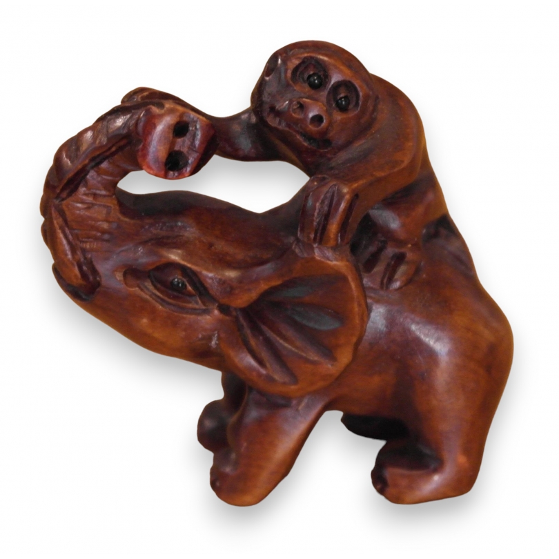  Netsuke en bois "Éléphant et singe" sur  Moinat SA  - Antiquités décoration