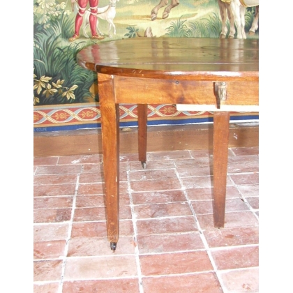 Mesa redonda de estilo Directorio con dos alas abatibles. En Moinat SA - Antigüedades y decoración