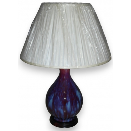  Lampe "Flambe" en porcelaine rouge et bleue sur  Moinat SA  - Antiquités décoration
