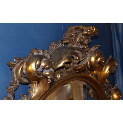  Miroir Rococo en résine dorée sur  Moinat SA  - Antiquités décoration